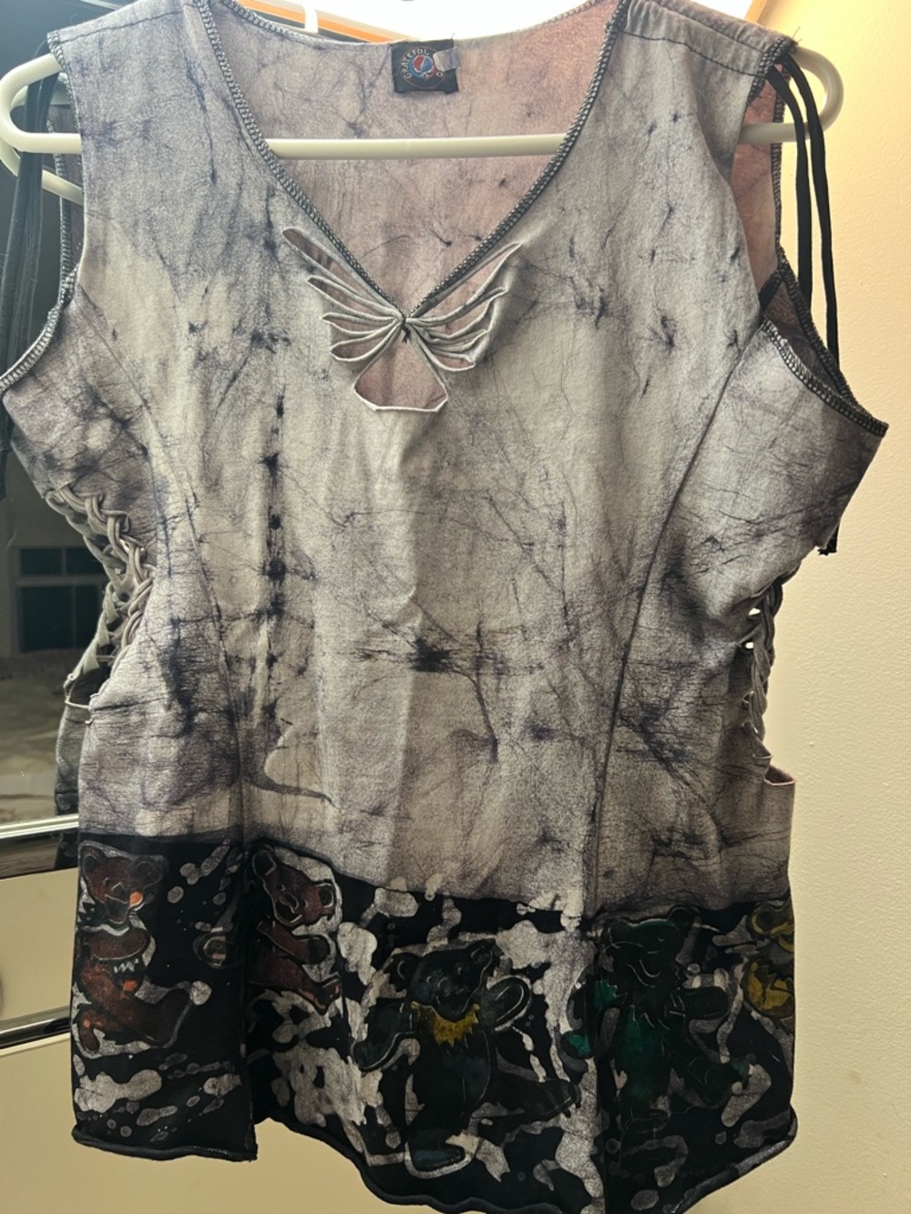 Jayli Gray Tie-Dye Sleeveless Top with Cutout Detail and Grateful Dead bears.